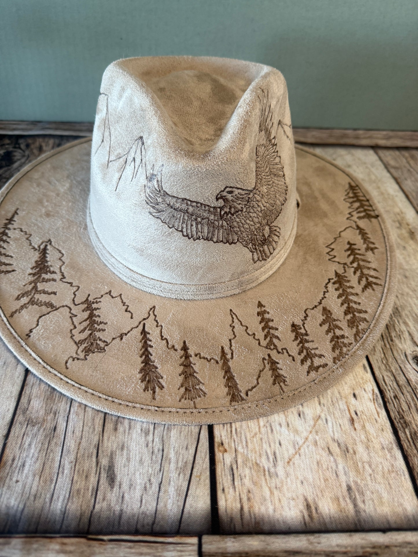 Eagle soaring over mountains