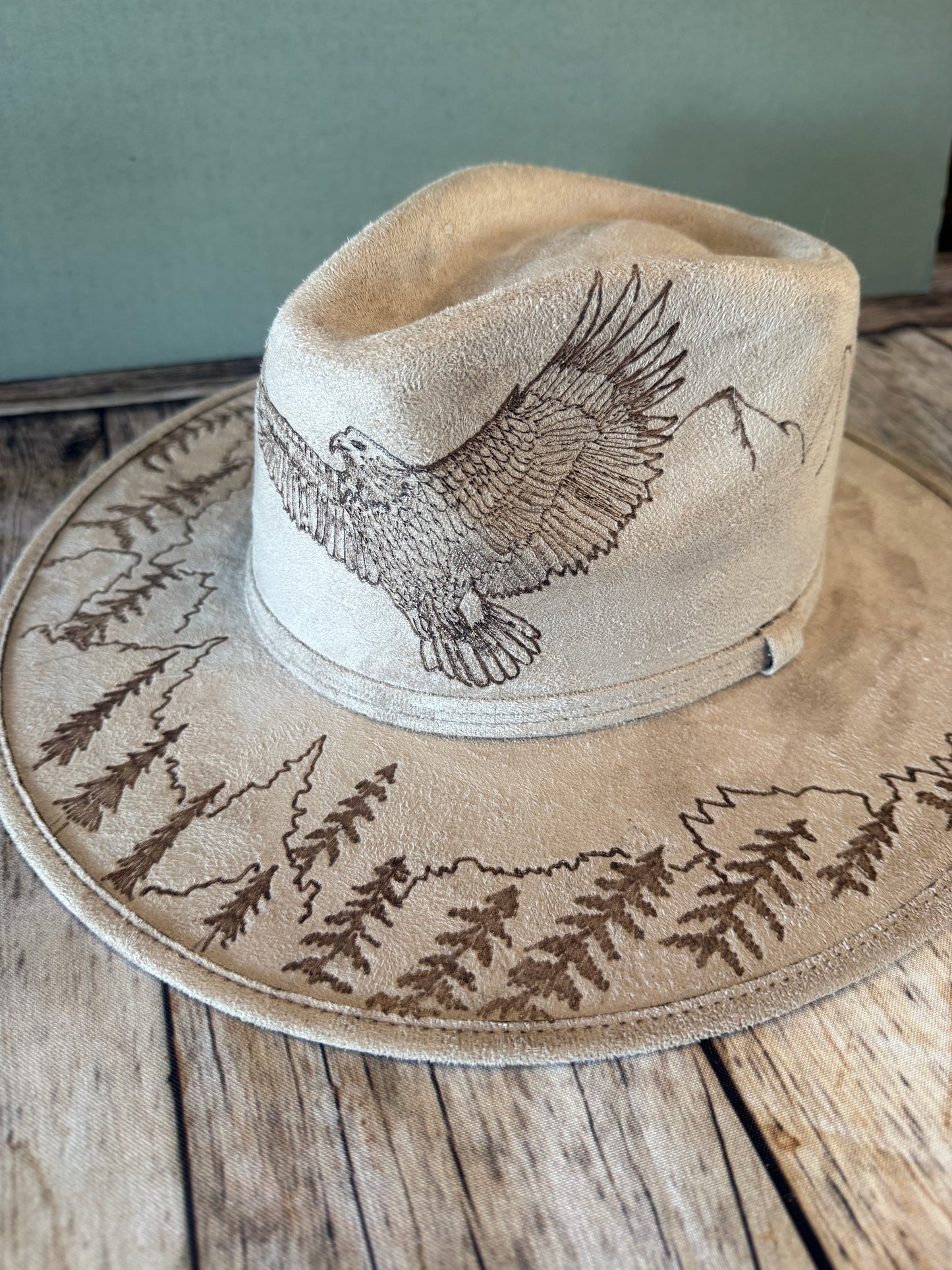 Eagle soaring over mountains