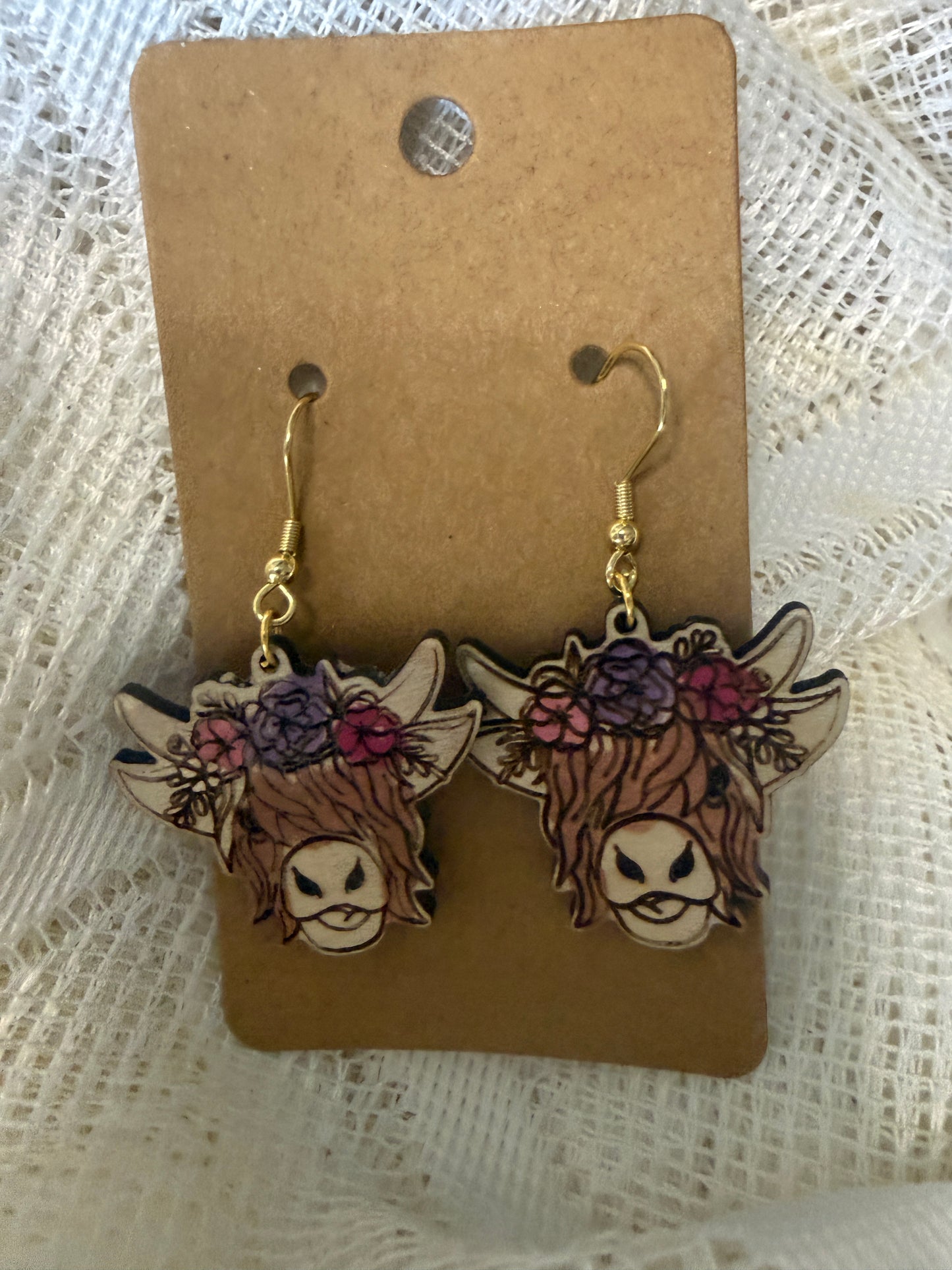 Highland cow head with floral design (painted)