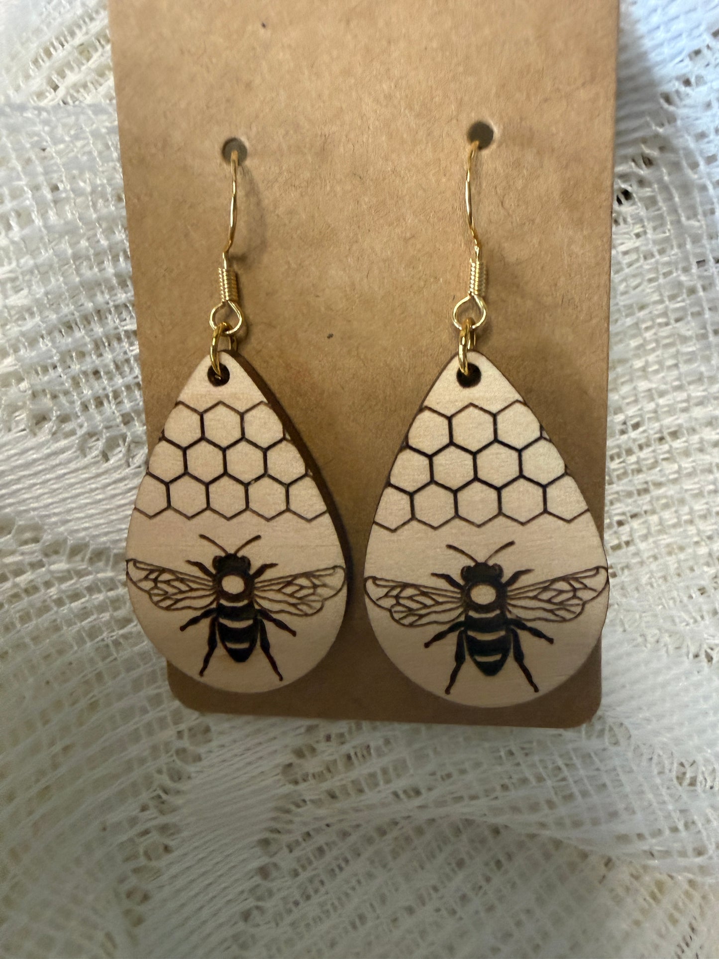 Bee with honeycomb